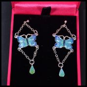 A pair of sterling silver and enamel drop earrings in the form of butterflies. In presentation box.