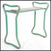 A retro mid century, circa 1950's green tubular metal and green canvas folding stool - gardeners