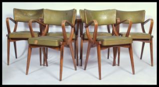 A set of 6 mid century Ben Chairs ( benchairs ) raised on angular bentwood frames with green