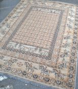 A believed mid century large Pazyryk rug depicting men on horseback and antelopes in the border