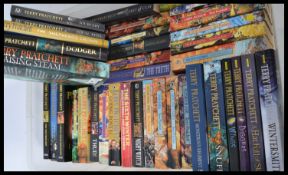 A large collection of approx 35 Terry Pratchett books to include some first editions. Titles to