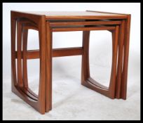 A G-Plan retro teak wood 1970's graduating nest of tables in the Quadrille pattern. The tables