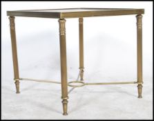 A good quality mid century brass and glass coffee table - occasional table being raised on reeded