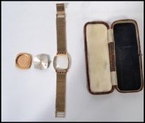 An 18ct gold vintage Gents Longines Automatic wristwatch having baton numerals with offset date