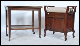 An Edwardian 20th century piano stool together with a similar aged card table raised on castors.