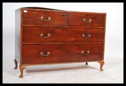 A 19th century mahogany two short drawers over two long drawers chest of drawers, fitted with drop