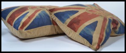 A decorative pair of vintage style rectangular cushions having good Union Jack design and central