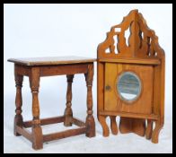 An early 20th century coffin  table / peg jointed type stool being raised on turned legs united by