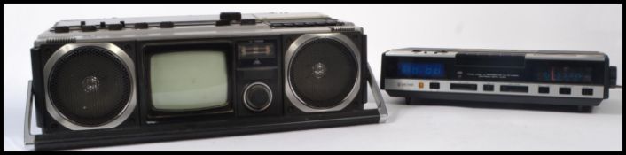 A Hitachi TV FM MW / LW stereo radio cassette recorder along with a Waltham Stereo Cassette recorder