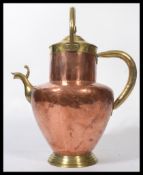 A Persian / Islamic Arabic brass Dallah middle eastern coffee / tea pot having an elongated spout