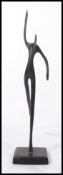 A vintage 20th century Art Deco bronze sculpture of a female dancer set to a square plinth base.