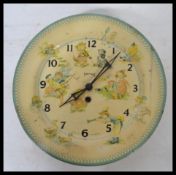 A vintage 20th century Smiths nursery rhyme clock having faceted hands with various characters