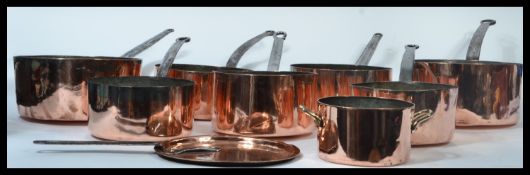 A good collection of eight country brass and copper saucepans dating from the 19th century Victorian