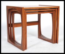 A G-Plan retro teak wood 1970's graduating nest of tables in the Quadrille pattern. The tables