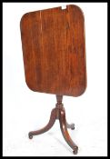 A 19th century mahogany tilt top breakfast - occasional wine table the rectangular top raised on