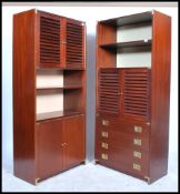A pair of retro 1970's mahogany campaign style wall cabinets - combination units, each of upright