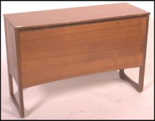 A retro 20th century Danish inspired teak wood record cabinet, fall front opening to reveal a