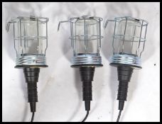 A set of 3 French modern Industrial style trouble cage lamps - inspection lamps with rubber