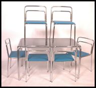 A superb 1970's chrome and glass dining table and chairs set. The 6 chrome chairs have been recently