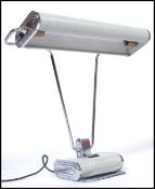 Eileen Gray - A Jumo edition art deco style desk lamp being raised on adjustable v-shaped rods