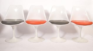 A set of 4 20th century Arkana style tulip dining chairs with good grey pad seats raised over