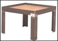 An unusual mid century  Industrial cast metal small table - ldeal as a lamp table - coffee table.