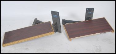 A pair of retro 20th century heavy duty speaker wa