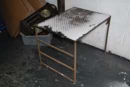 A vintage retro 20th century industrial work bench