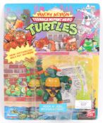 TEENAGE MUTANT NINJA TURTLES CARDED ACTION FIGURE