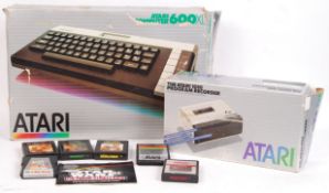 VINTAGE ATARI GAMES CONSOLE & RELATED ITEMS
