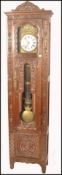 A 19th century French chestnut / oak large compoise longcase clock having  oversized trunk and