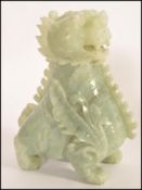 An unusual large Chinese Jade fu dog - temple dog