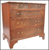 A 19th century Georgian small proportion mahogany 2 over 3 chest of drawers. Raised on ogee
