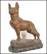Thomas Cartier ( 1879-? ) A French large gilded hollow cast gilded spelter statue of an alsatian dog