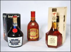 A Wild Turkey export Bourbon Liqueuer 750ml  80% proof in box together with a bottle of Glayva