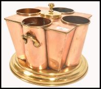 A stunning copper and brass wine cooler bearing the stamp for cruise liner SS Boston by G Peak and