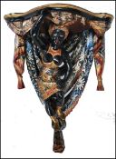 A believed 19th century blackamoor carved wooden gilded and painted corner wall bracket - clock