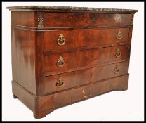 A 19th century French walnut and black/grey veined marble commode chest of drawers. Raised on