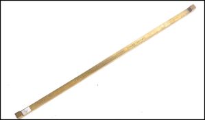 A Victorian brass Imperial Yard measure stick by De Grave of London for Borough of Daventry / County