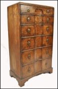 A good Queen Anne 19th century walnut concave fronted chest of drawers. The chest with pierced brass
