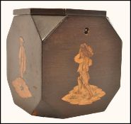 A 19th century Sorrento ware tea caddy of octagonal form with faceted sides. Each side having an