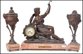 An early 20th century French bronze and marble 3 p