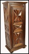 A 19th century country oak French Bonnetiere hall cupboard / armoire linen press. The upright sentry