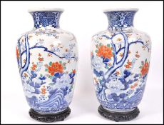 A good pair of 19th century Meiji Period Arita porcelain large vases. Each of large baluster form