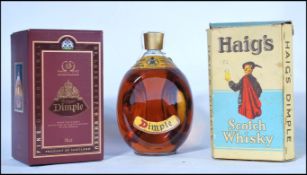 A vintage bottle of Haig's Dimple old blended Scotch Whisky complete with box together with