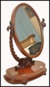 A  good large Victorian 19th century ladies large dressing table jewellery mirror being raised on
