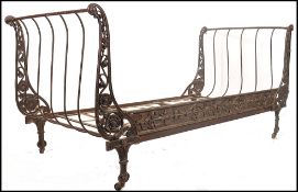 A 19th century French cast Iron day bed of folding
