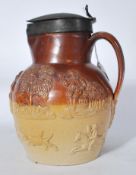 An early 19th century London Salt Glazed Stoneware ewer jug by Vauxhall pottery. The two tone jug of