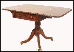 A good 19th century Regency solid mahogany drop leaf sofa table, Raised on reeded splayed legs