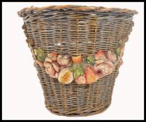 A 19th century Victorian wicker and gesso worked barbola crafts basket. The tapering cylindrical bin